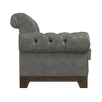 Fauteuil d'appoint capitonné à accoudoirs volutes et clous de tapissier