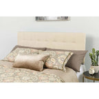 Tête de lit capitonnée en tissu beige taupe pour grand lit